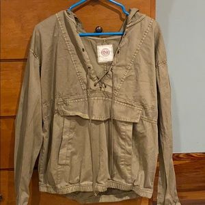 tan jacket with strings never worn
